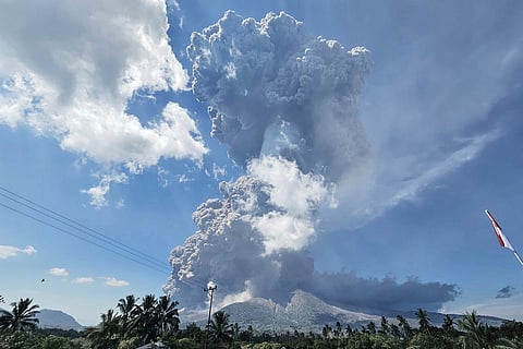 In photo released by Geological Agency (Badan Geologi) of the Indonesia's Ministry of Energy and Mineral Resources, Mount Lewotobi Laki-Laki spews volcanic materials during an eruption in East Flores, Indonesia