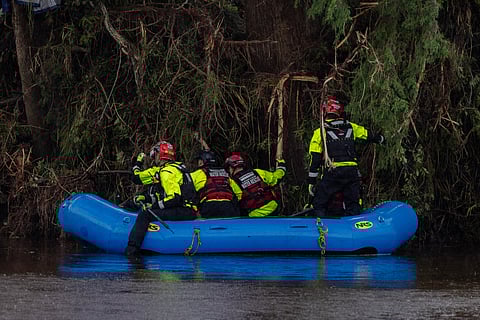 Search and recovery workers dig through debris looking for any survivors or remains of people swept up in the flash flooding at Camp Mystic on July 6, 2025 in Hunt, Texas.