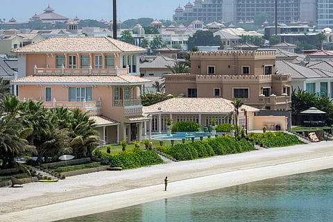 A picture shows beachfront villas in the Palm Jumeirah in the Gulf emirate of Dubai on July 8, 2025.