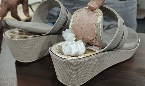 Acting on a tip-off, EAGLE apprehended Annamaneni outside his restaurant on July 7. What they found stunned investigators. Hidden inside a woman’s sandal, packed in a pink cardboard box marked under the alias “Fatima,” were two packets of cocaine — part of a shipment couriered from Delhi.