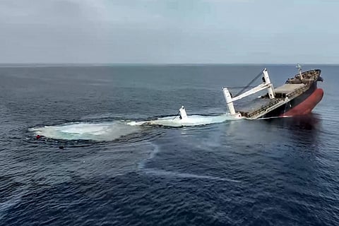 This handout picture released by Yemen's Houthi Ansarullah Media Centre on July 8, 2025 shows the Liberia-flagged bulk carrier Eternity sinking C after it was attacked by the Houthis at sea.