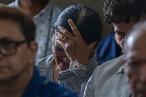 Mother of Clive Kunder, co-pilot of the Air India flight that crashed in Ahmedabad last month, mourns during a prayer meeting for the Air India crew, at a church in Mumbai, India, Saturday, July 12, 2025.