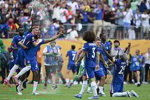 Chelsea's players celebrate after the FIFA Club World Cup 2025 final football match between England's Chelsea and France's Paris Saint-Germain at the MetLife Stadium in East Rutherford, New Jersey on July 13, 2025.