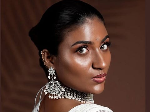 She won titles like Miss Dark Queen Tamil Nadu, Miss Pondicherry, and Queen of Madras, and in 2023, represented India at Miss Africa Golden, walking ramps in cities like London, Paris, and Berlin.