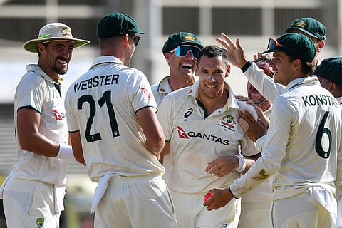 Australian players celebrate during their 3-0 Test series win over West Indies last month.