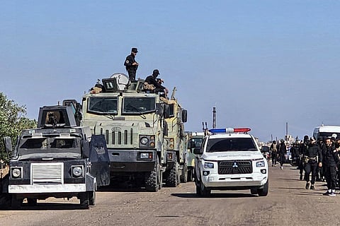 This handout picture released by the official Syrian Arab News Agency (SANA) shows Syrian army and security forces deploying in Sweida in southern Syria on July 14, 2025 following clashes between Bedouin tribes and local fighters in the predominantly Druze city.