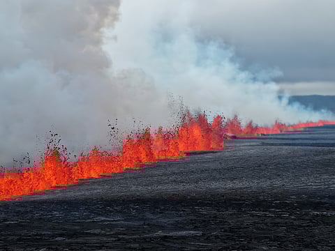 Lava and smoke erupting from a volcano near Grindavik on the Icelandic peninsula of Reykjanes.