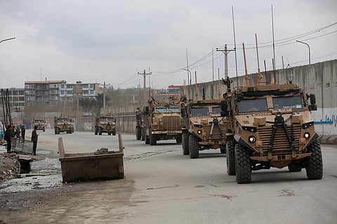 This March 25, 2020 file photo shows British troops with NATO-led Resolute Support Mission forces in Kabul, Afghanistan.