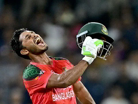 Bangladesh's Tanzid Hasan celebrates after guiding Bangladesh to eight-wicket win in the third and final T20 in Colombo on Wednesday.