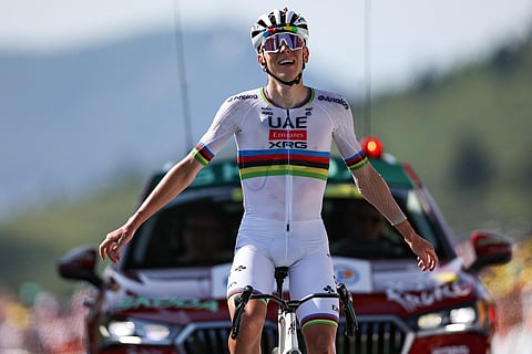 UAE Team Emirates - XRG team's Slovenian rider Tadej Pogacar cycles to the finish line to win the 12th stage of the 112th edition of the Tour de France cycling race, 180.6 km between Auch and Hautacam, in the Pyrenees mountains of southwestern France, on July 17, 2025.