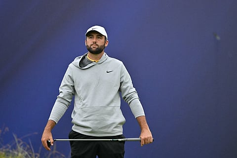 US golfer Scottie Scheffler reacts after missing the course record when his putt failed to drop on the 18th green on day two of the 153rd Open Championship at Royal Portrush on Friday.