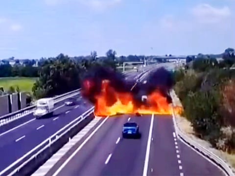 Two killed as light aircraft crashes onto Italian highway — caught on camera