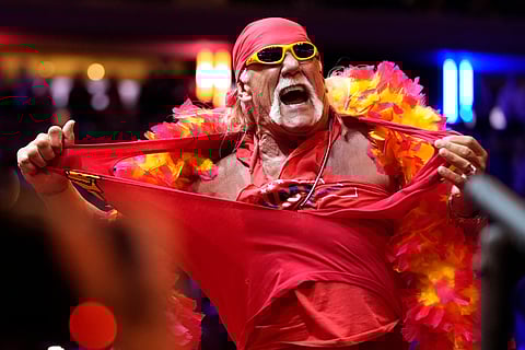 FILE - Hulk Hogan rips his shirt before Republican presidential nominee former President Donald Trump speaks at a campaign rally at Madison Square Garden, Oct. 27, 2024, in New York.