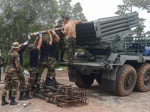 Cambodian soldiers reload the BM-21 multiple rocket launcher in Preah Vihear province on July 24, 2025.