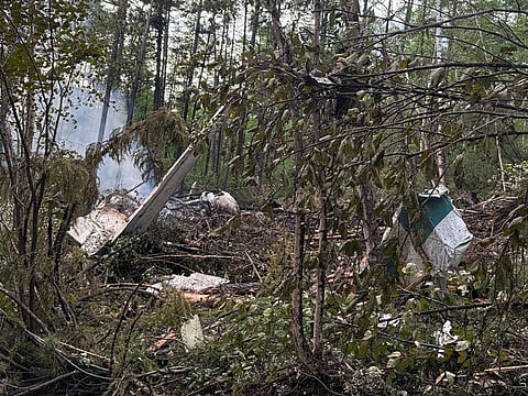 This handout picture, released by the Far Eastern Transport Prosecutor's Office on July 24, 2025, shows, according to the office, the crash site of the Antonov AN-24 passenger plane outside the town of Tynda in Russia's Far Eastern Amur region. Rescuers found no survivors at the site where a plane crashed in Russia's far eastern Amur region earlier on July 24, 2025, Russian state media reported.