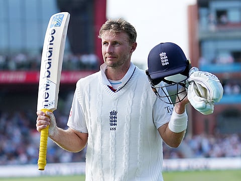 England's Joe Root acknowledge the fans as he walks off the field after getting dismissed during the third day of the fourth Test against India at Emirates Old Trafford.