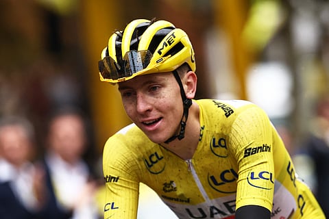 UAE Team Emirates - XRG team's Slovenian rider Tadej Pogacar cycles to the finish line of the 21st and final stage of the 112th edition of the Tour de France cycling race.