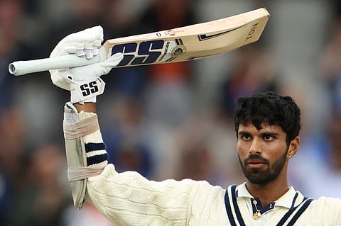 India's Washington Sundar celebrates after scoring a century on day five of the fourth Test against England at Old Trafford on Sunday.