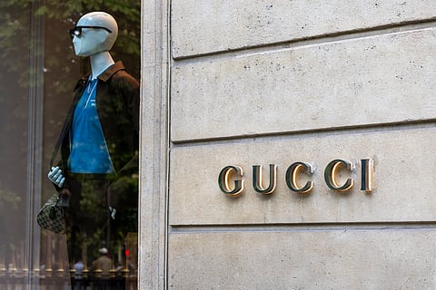 A facade of a shop of Italian luxury fashion brand Gucci on Rue Montaigne in Paris.