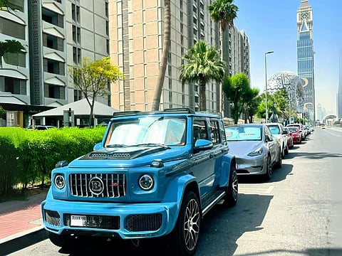 It's a head-turning 4WD monster with a Brabus kit, wrapped in a rare bluish finish and bold orange leather inside.