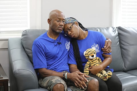 Clarence and Ebony Carr hug as they talk about the death of their son from a brain-eating amoeba he got at a popular South Carolina lake.