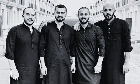 Rajab Butt and buddies at a happier time