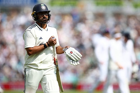 India's Karun Nair reacts as he walks back to the pavilion after losing his wicket on day two of the fifth Test cricket match between England and India at The Oval in London on August 1, 2025.