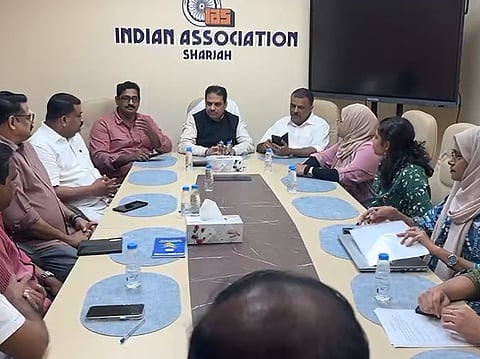 Indian Association Sharjah (IAS) President Nissar Thalangara leads a discussion following the formal launch of the new community initiative.