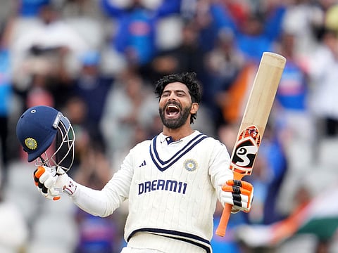 India's Ravindra Jadeja celebrates after scoring fifty runs during the third day of the fifth cricket test match between England and India at The Kia Oval in London, Saturday, Aug. 2, 2025.