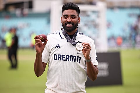 India's Mohammed Siraj poses with the match ball and his medal after India won the final Test against England at The Oval in London on Monday.
