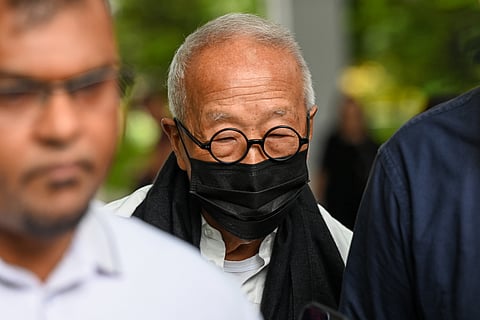 Malaysian hotel tycoon Ong Beng Seng (C) leaves the State Court in Singapore on August 4, 2025.