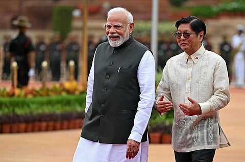 Philippine President Ferdinand Marcos (R) speaks with India's Prime Minister Narendra Modi during his ceremonial reception at India’s presidential palace Rashtrapati Bhavan in New Delhi on August 5, 2025.
