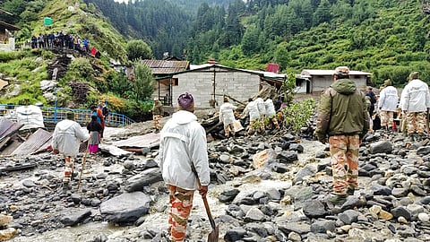 This handout photograph released on August 6, 2025 by the Uttarakhand's State Disaster Response Force (SDRF) shows members of Indian security forces carrying out a rescue operation after a flash flood in India's Uttarakhand state.