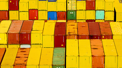 Cargo containers are seen at a shipping terminal at the Port of Oakland on Wednesday, Aug. 6, 2025, in Oakland, Calif.