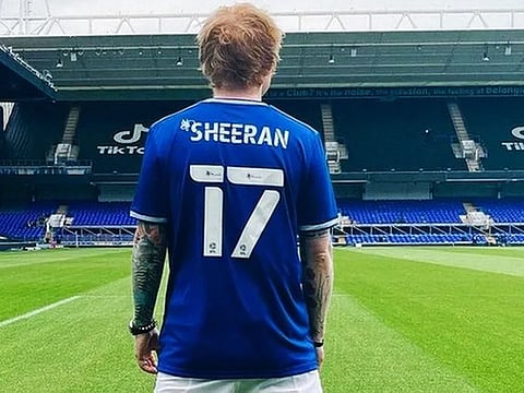 Ed Sheeran wears Ipswich Town's number 17 shirt.