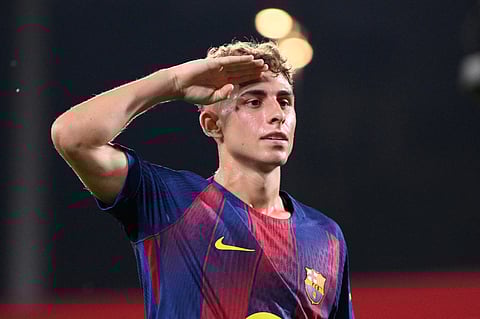 Barcelona's Spanish midfielder Fermin Lopez celebrates scoring the opening goal during the 60th Joan Gamper Trophy football match between FC Barcelona and Como 1907 at Johan Cruyff Stadium in Barcelona on August 10, 2025.