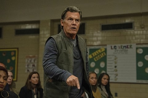 This image released by Warner Bros. Pictures shows Josh Brolin in a scene from "Weapons." (Quantrell Colbert/Warner Bros. Pictures via AP)