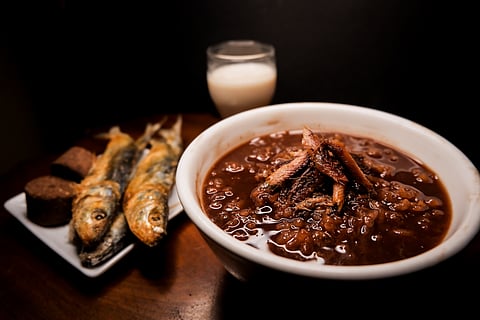 Champorado is made with glutinous rice, sugar and cocoa, served hot or cold, often drizzled with condensed milk or paired with salted dried fish.