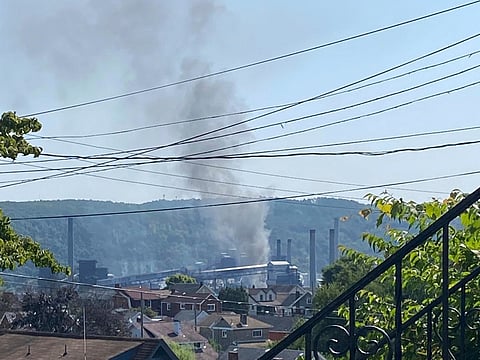 This image provided by Amy Sowers shows smoke from the U.S. Steel Clairton Coke Works.