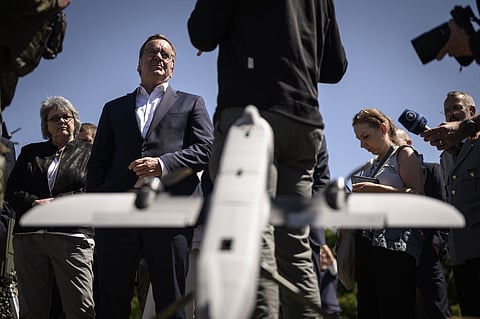 German Defence Minister Boris Pistorius, right, during a drone demonstration in July.