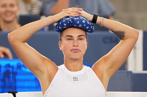Aryna Sabalenka sits on the bench during a break of the match against Jessica Bouzas Maneiro of Spain at Cincinnati Open in Mason, Ohio, on Wednesday.