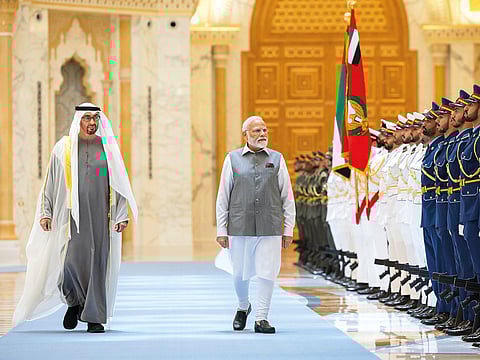 President His Highness Shaikh Mohammad Bin Zayed Al Nahyan and Indian Prime Minister Narendra Modi inspect a guard of honour in Abu Dhabi upon Narendra Modi’s arrival at Qasr Al Watan in 2023.