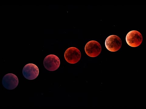 The red glow stems from sunlight refracted through Earth’s atmosphere, filtering out blue light and letting red and orange tones illuminate the Moon.