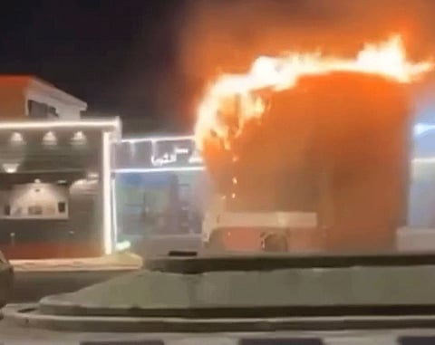 Social media users shared videos and photos showing Al Dalbahi leaping onto the burning truck and driving it away from the station.