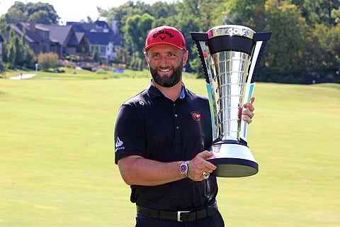 Jon Rahm of Legion XIII poses with the LIV golf season individual trophy on day three of LIV Golf Indianapolis at The Club at Chatham Hills on Sunday.