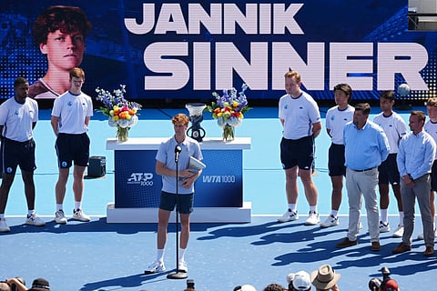 Jannik Sinner of Italy speaks to the crowd after retiring during the men's singles final against Carlos Alcaraz of Spain during Day 12 of the Cincinnati Open at the Lindner Family Tennis Center on August 18, 2025 in Mason, Ohio.