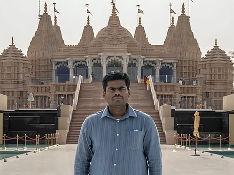 K. Annamalai stands in front of the majestic BAPS Hindu Mandir in Abu Dhabi during his visit.