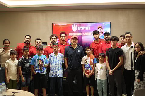 Robin Singh with UAE players, winners of the quiz programme and young aspirants during the inauguration of the RSR Cricket Academy.