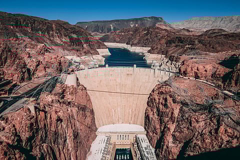 Stunning aerial shot of the Hoover Dam, completed in 1935. Its hydroelectric plant produces 2,080 MW, providing power to much of the US west coast.