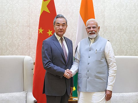 The Indian premier said on Tuesday he was "glad to meet" Wang in New Delhi.